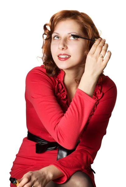 Chica en vestido rojo maquillaje — Foto de Stock