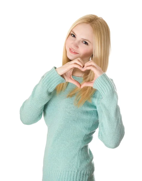 Blond meisje toont hart — Stockfoto