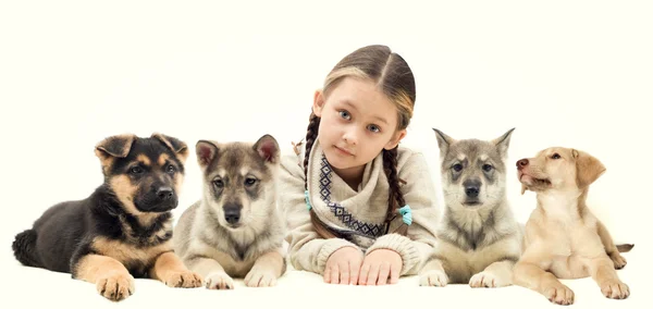 Kind en puppies — Stockfoto