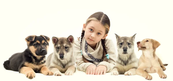 Child hugging a puppy — Stock Photo, Image