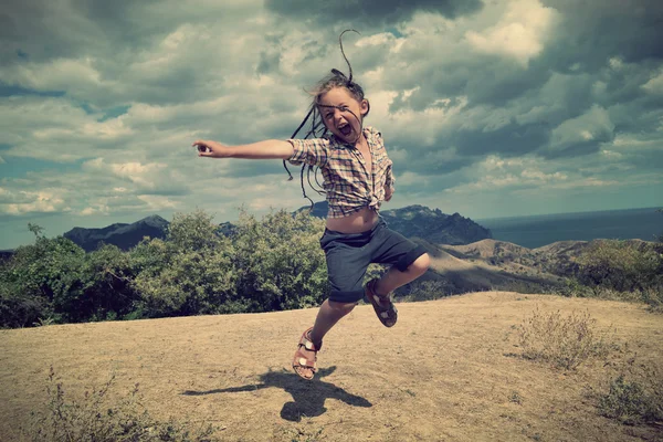 Little girl jumping — Stock Photo, Image