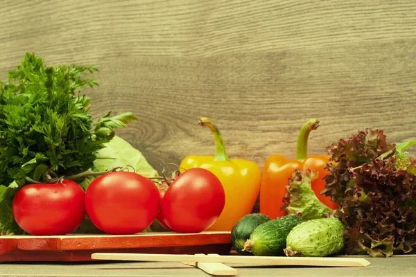 Vegetables on a wooden background — Stock Photo, Image