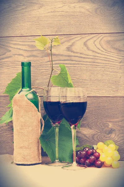 Grape, two glasses and bottle of wine — Stock Photo, Image