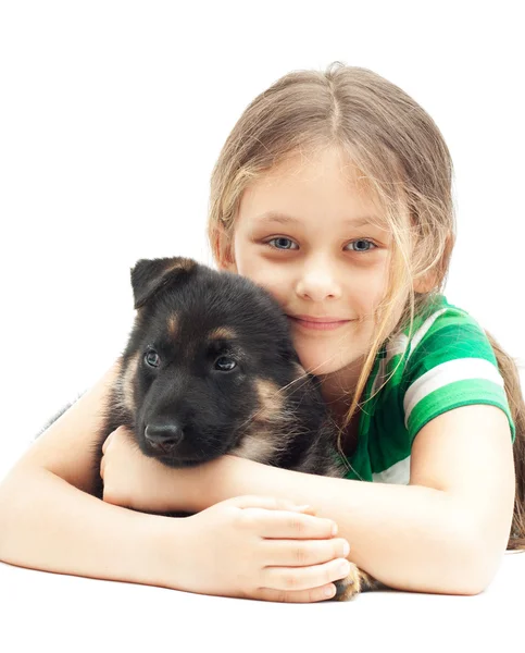 Ragazza abbracciare un cucciolo — Foto Stock