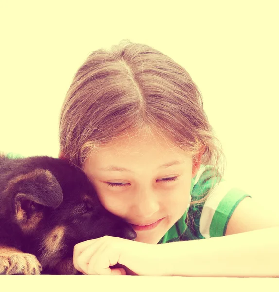 Girl and puppy — Stock Photo, Image