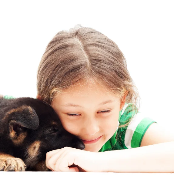 Kleines Mädchen und Welpe — Stockfoto