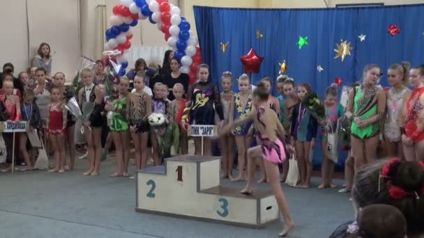 Awarding ceremony for girls, sports pedestal — Stock Video