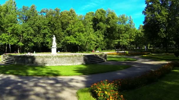 Beautiful classical park with statue — Stock Video