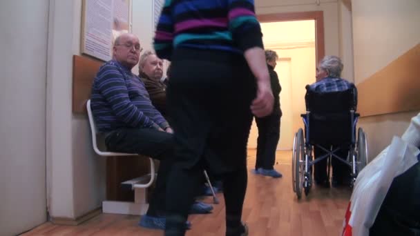 The Patient In A Wheelchair In The Clinic — Stock Video