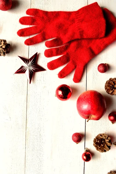 Red glove with Christmas ornaments