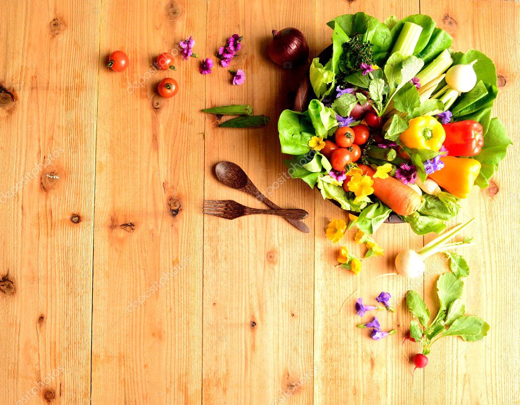 Fresh vegetables with spring flowers — Stock Photo © yonibunga 18672643