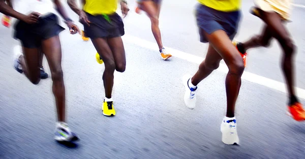 Corredores de maratón - movimiento borroso — Foto de Stock