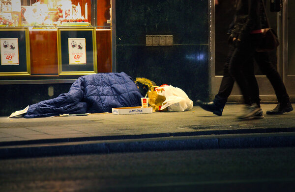 Homeless man sleeping on the street