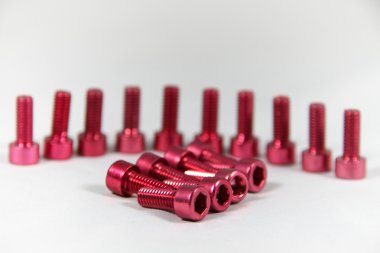 Red anodized hexagon socket / screw clipart