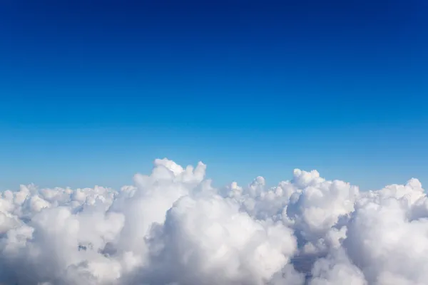 Cloudscape. Blue sky and white cloud.