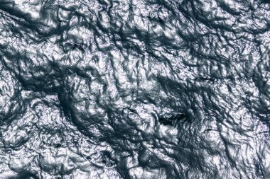 doku su yüzey güneşli gün.