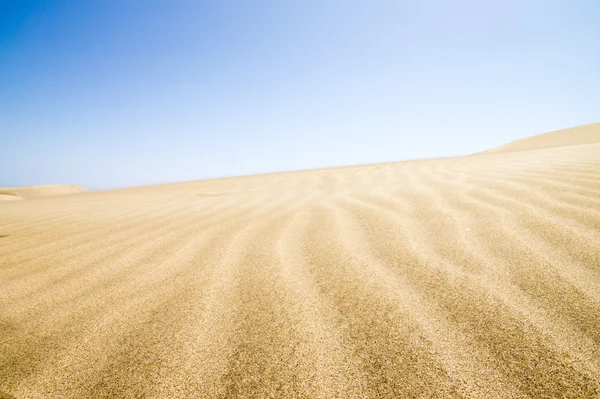 Sand dunes stretching into the distance. — Stock Photo, Image