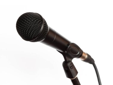 Microphone with a cable and stand on white background
