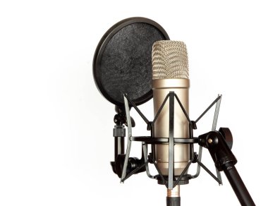 Microphone with a cable and stand on white background