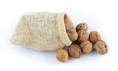 Walnuts in a sack on white background