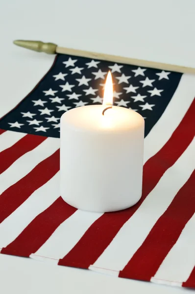 American flag and a candle. — Stock Photo, Image