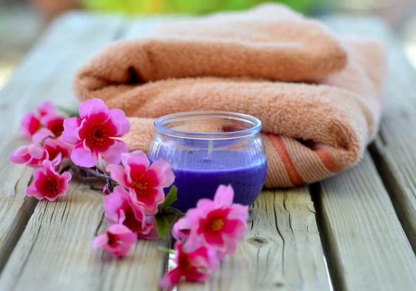 Towel candle flowers — Stock Photo, Image
