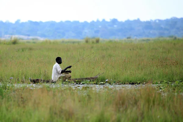 Rybář - jezero anapa - uganda, Afrika — Stock fotografie