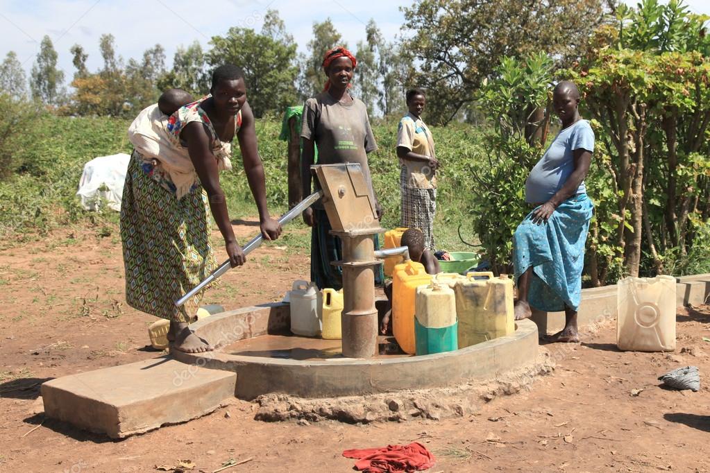 Pumping Water Uganda, Africa Stock Editorial Photo © imagex 12339518