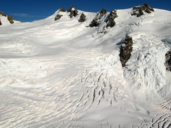 Montanhas cobertas de neve - Alpes do Sul, Nova Zelândia — Fotografia de Stock