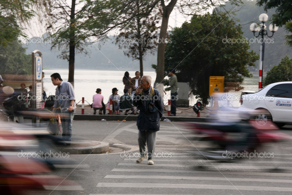 Vietnam — Crossing the road in Hanoi, Vietnam