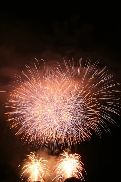 Fireworks over a lake — Stock Photo, Image