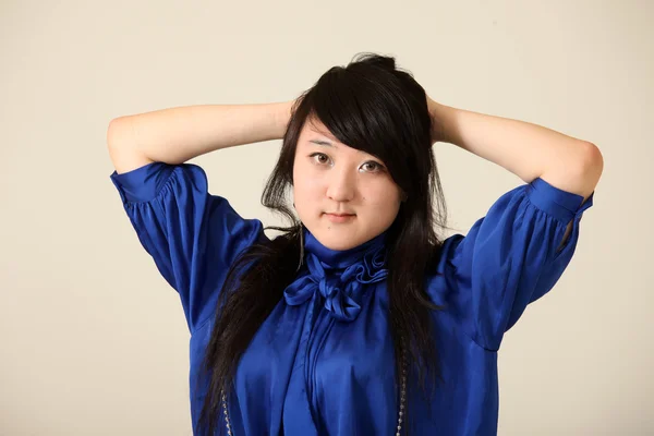 Krásná mladá asijská žena — Stock fotografie