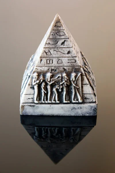 Decorative pyramid isolated over black background — Stock Photo, Image