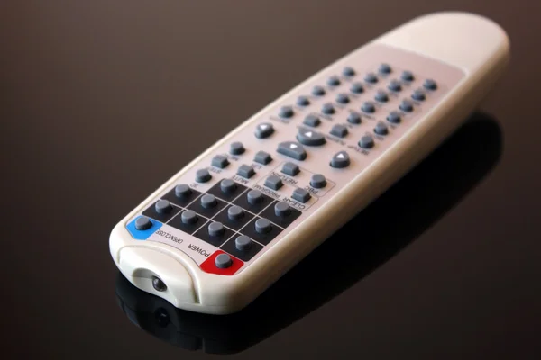 Remote control on the black background — Stock Photo, Image