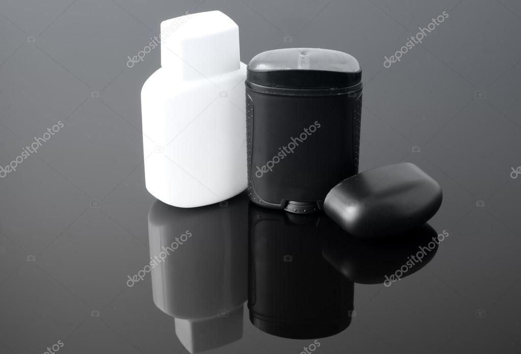 No name recipients of body care products over black background