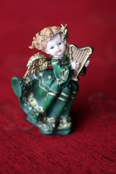 Ceramic trinket representing an angel to harp — Stock Photo, Image