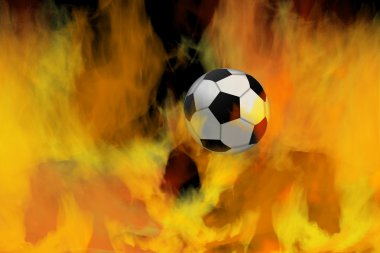 Futbol topu alevler arasından