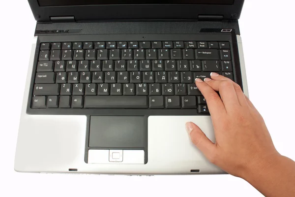 Hand pressing the "enter" on the laptop — Stock Photo, Image
