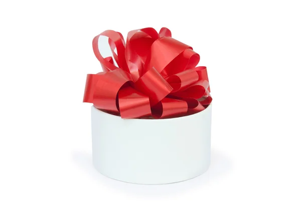 Present round box with a red bow — Stock Photo, Image