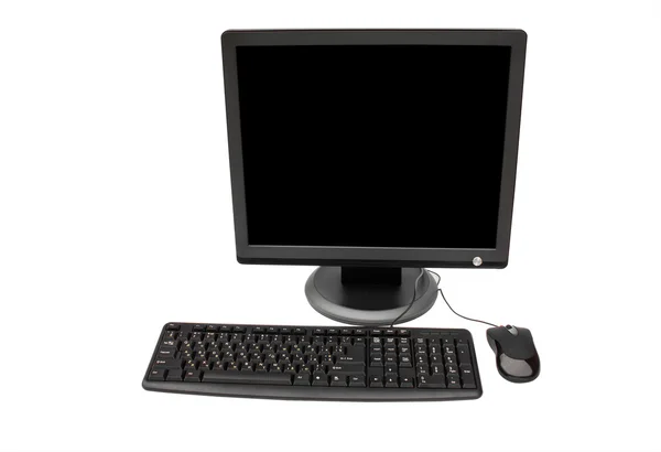 Black monitor, keyboard and mouse — Stock Photo, Image