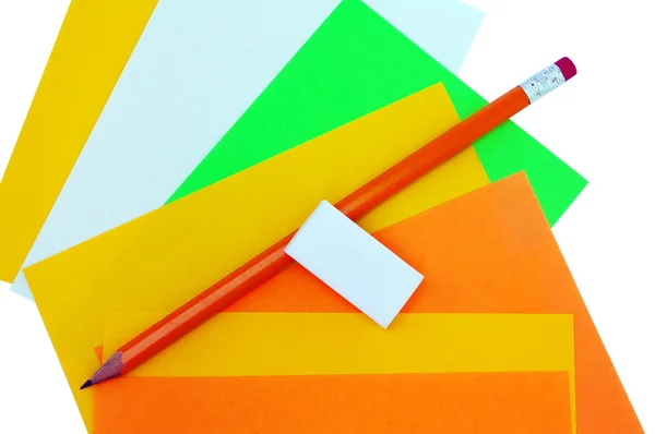 Different colors of papers and pencil with eraser — Stock Photo, Image