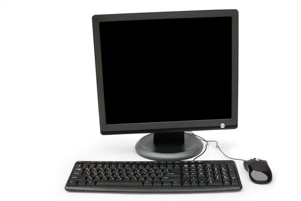 Monitor preto, teclado e mouse — Fotografia de Stock