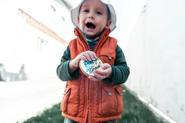 Toddler Holding Cookies Words Pray Ukraine — Stock Photo, Image
