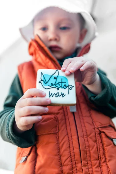 Little Boy Holding Cookies Words Stop War — Stock Photo, Image