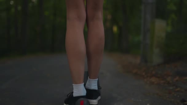 Camera Follows Young Woman Riding Electric Scooter Naked Legs Wearing — Vídeo de Stock