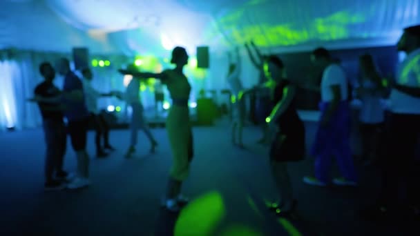 Defocused Happy Party People Dancing Laughing While Listening Band Performing — Stockvideo