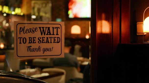 Please Wait Seated Sign Entrance Busy Restaurant Real Time — Stockvideo