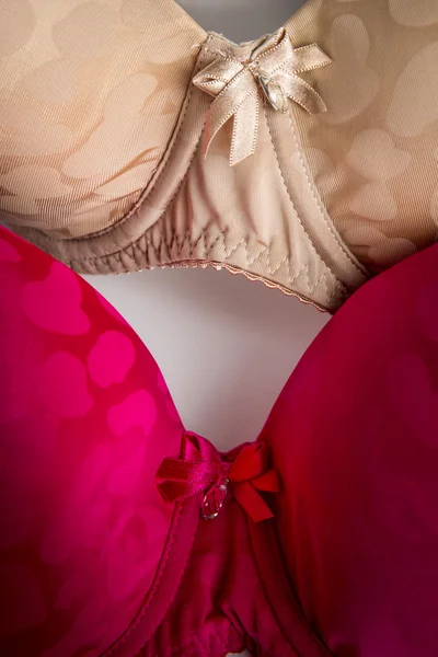 Stylish bra red and beige — Stock Photo, Image