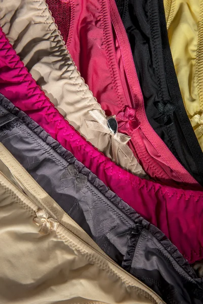 Vrouwelijke, kleurrijke kledingassortiment broek — Stockfoto