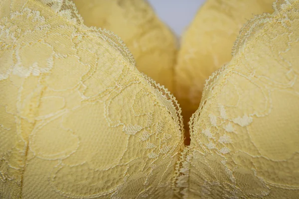 Detail of yellow bra — Stock Photo, Image